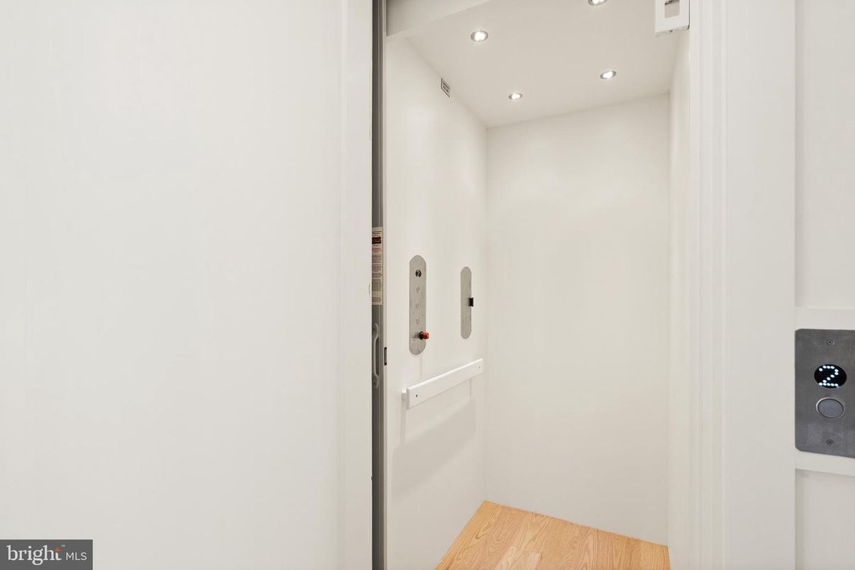 Elevator, Interior, Recessed Lighting, Wood Texture Flooring