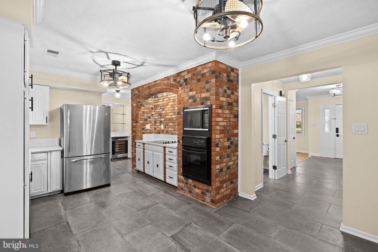 Interior, Kitchen, Pendant Lights, Stainless Steel Appliances, Stone Walls