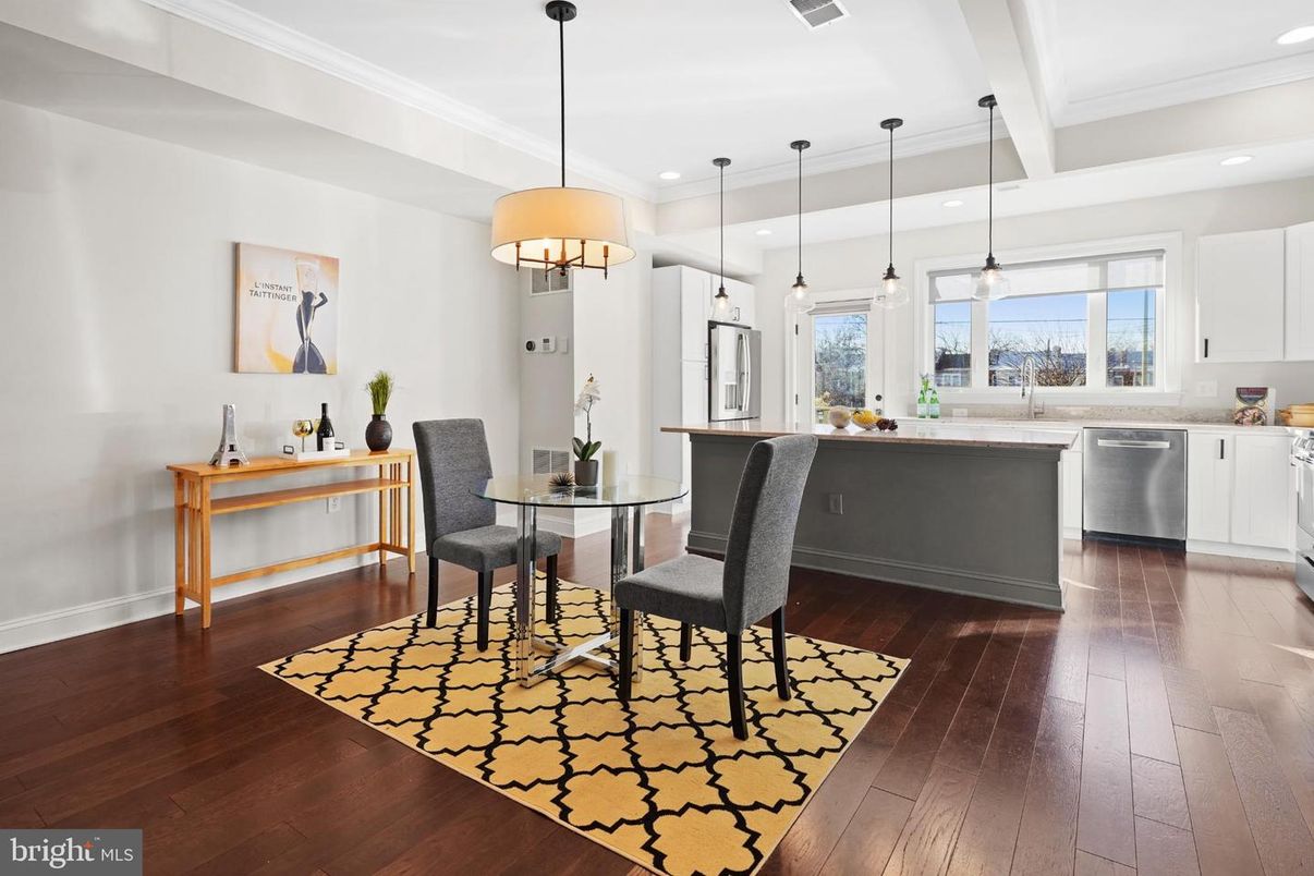 Dining room, Interior, Kitchen, Pendant Lights, Recessed Lighting, Stainless Steel Appliances, Wood Texture Flooring