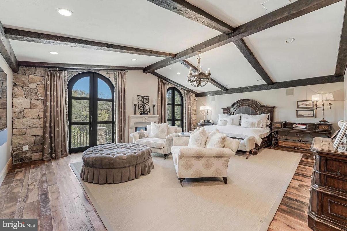 Bedroom, Chandelier, Fireplace, Interior, Recessed Lighting, Stone Walls, Wooden Beams, Wood Texture Flooring