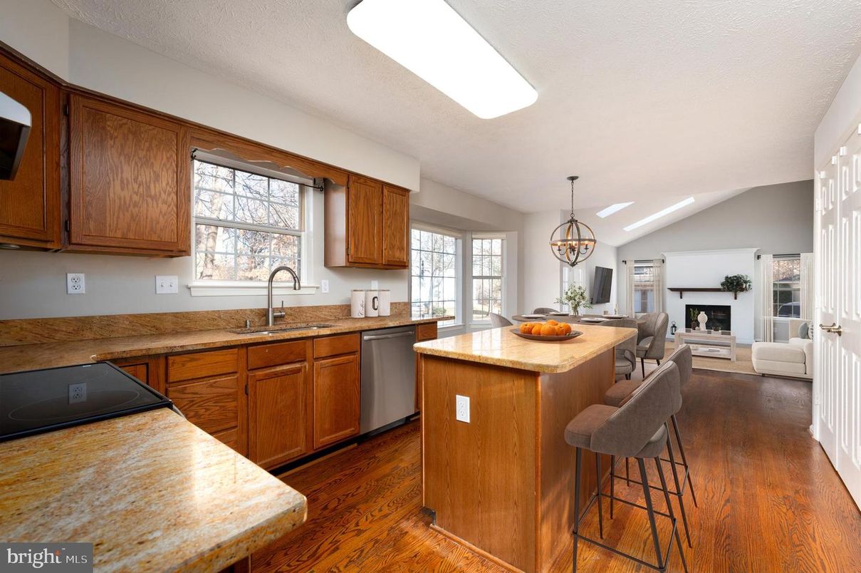 Chandelier, Dining room, Fireplace, Interior, Kitchen, Living room, Pendant Lights, Wood Texture Flooring