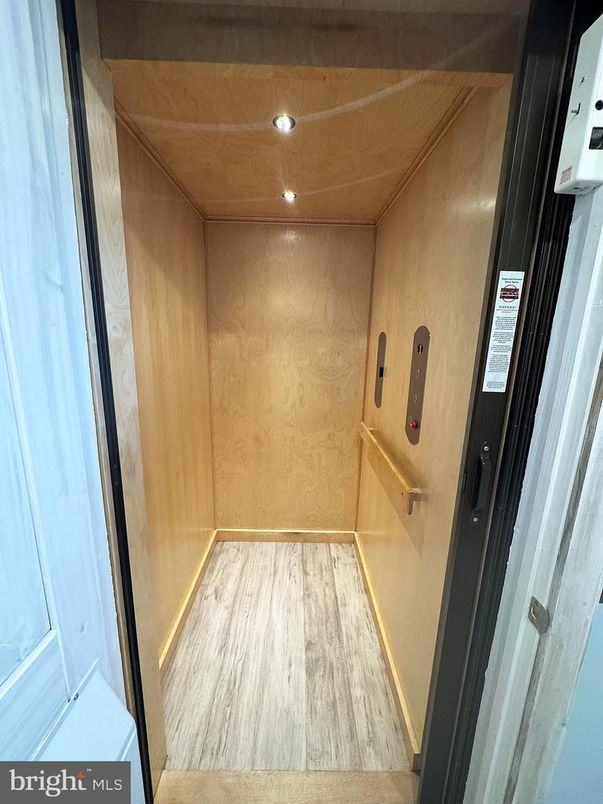 Elevator, Interior, Recessed Lighting, Wooden Ceilings, Wood Texture Flooring, Wooden Walls