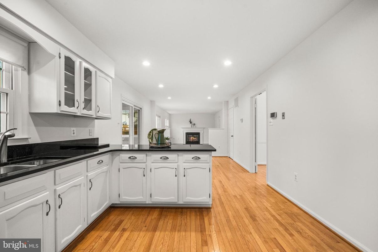Fireplace, Interior, Kitchen, Recessed Lighting, Wood Texture Flooring