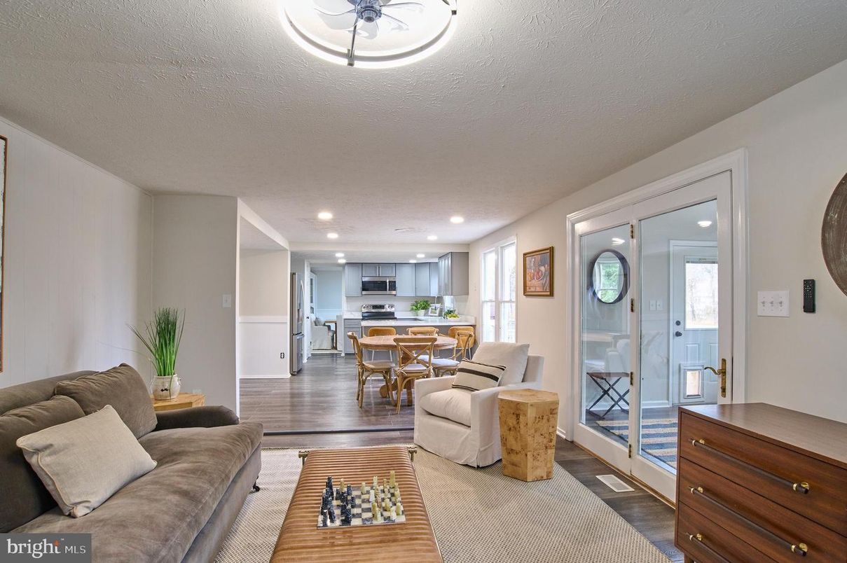 Dining room, Interior, Kitchen, Living room, Recessed Lighting, Stainless Steel Appliances, Wood Texture Flooring