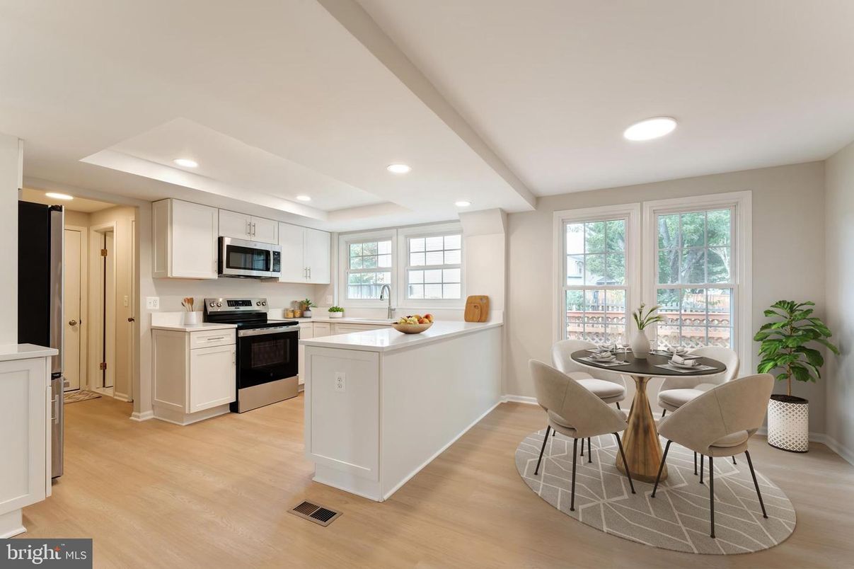 Dining room, Interior, Kitchen, Recessed Lighting, Stainless Steel Appliances, Wood Texture Flooring