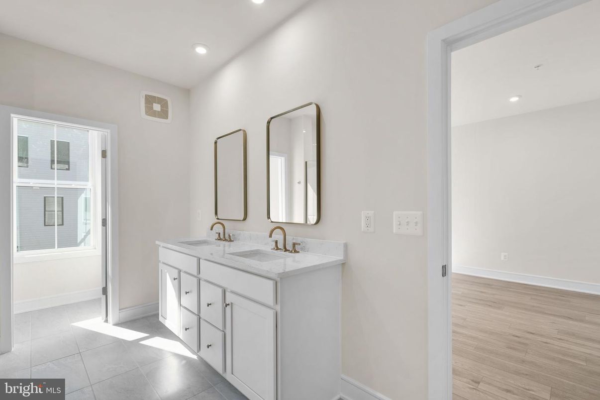Bathroom, Dual Sink Vanities, Interior, Recessed Lighting, Wood Texture Flooring