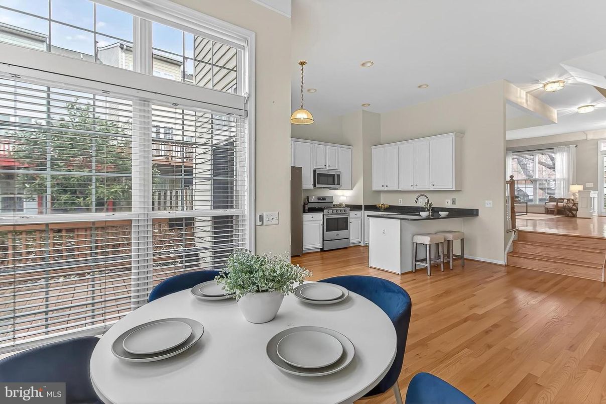 Dining room, Interior, Kitchen, Pendant Lights, Recessed Lighting, Stainless Steel Appliances, Wood Texture Flooring