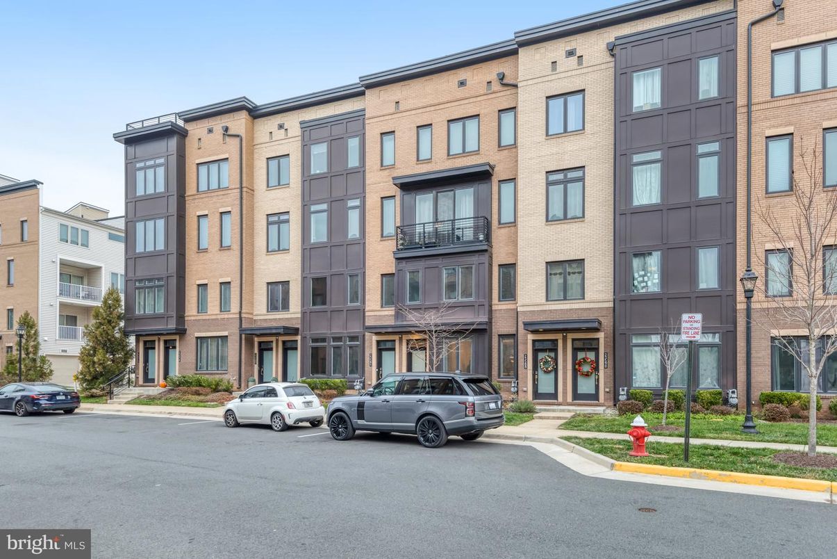 Exterior, Facade, Brick Facade, Condo Building