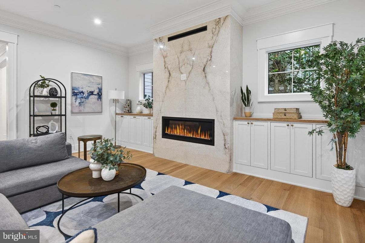 Fireplace, Interior, Living room, Marble Walls, Recessed Lighting, Wood Texture Flooring