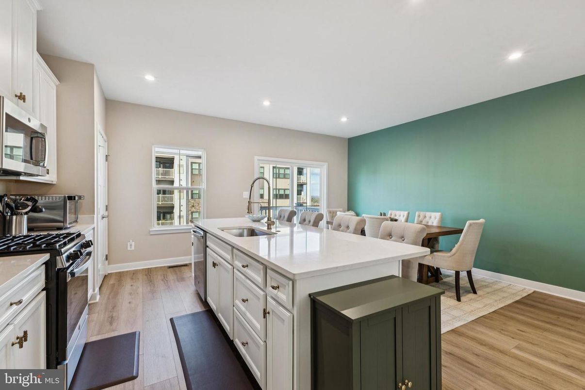 Dining room, Interior, Kitchen, Recessed Lighting, Stainless Steel Appliances, Wood Texture Flooring