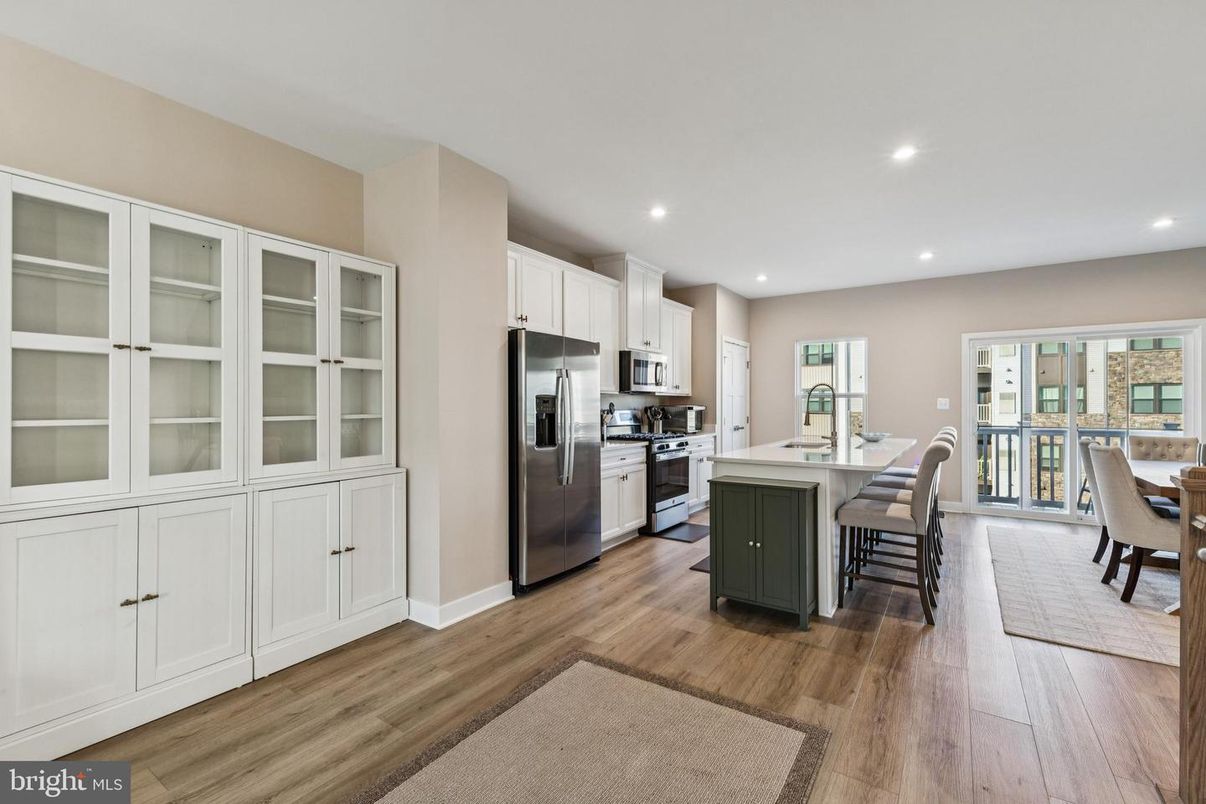 Dining room, Interior, Kitchen, Recessed Lighting, Stainless Steel Appliances, Wood Texture Flooring