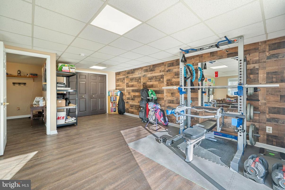 Fitness Equipment, Interior, Recessed Lighting, Wood Texture Flooring, Wooden Walls