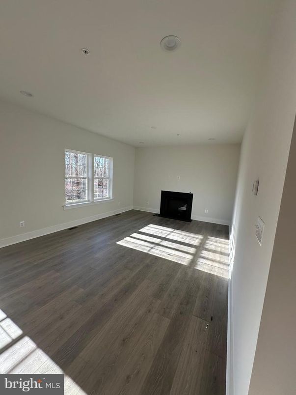 Empty room, Fireplace, Interior, Recessed Lighting, Wood Texture Flooring