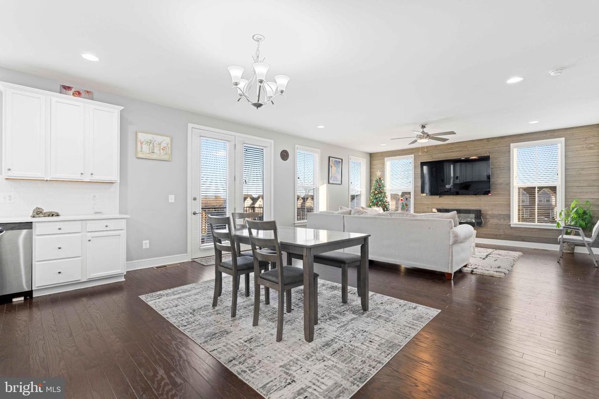 Chandelier, Dining room, Fireplace, Interior, Living room, Recessed Lighting, Wood Texture Flooring