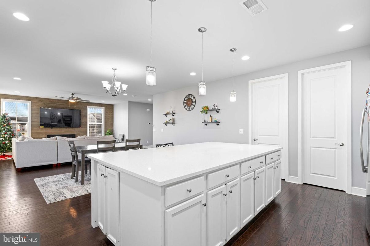 Chandelier, Dining room, Interior, Kitchen, Living room, Pendant Lights, Recessed Lighting, Wood Texture Flooring