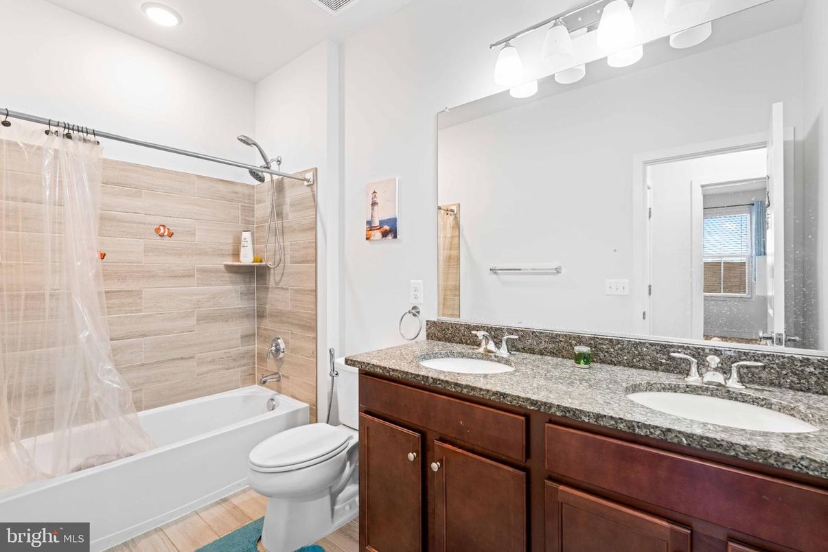 Bathroom, Dual Sink Vanities, Interior, Recessed Lighting, Wood Texture Flooring