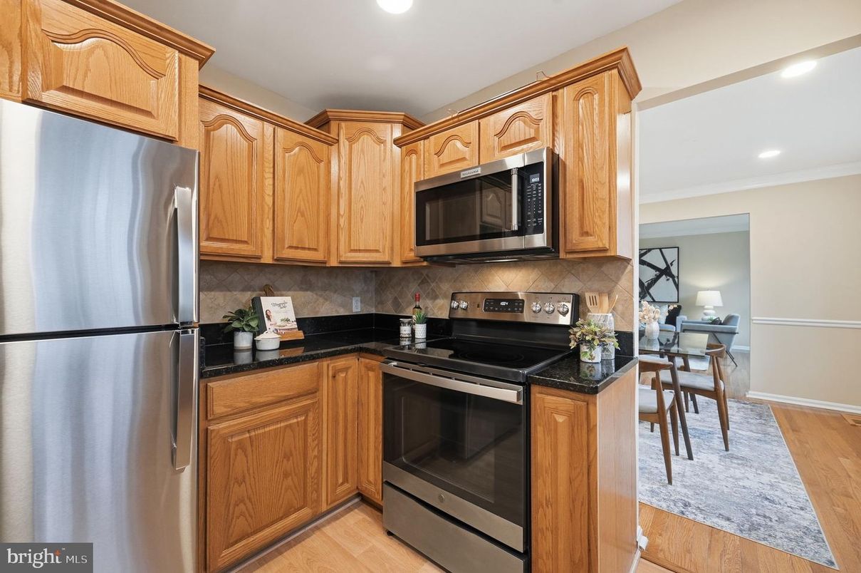 Dining room, Interior, Kitchen, Recessed Lighting, Stainless Steel Appliances, Wood Texture Flooring
