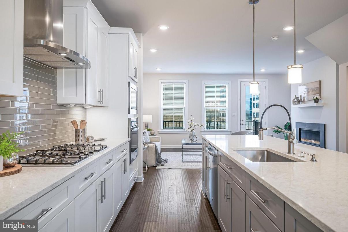 Fireplace, Interior, Kitchen, Pendant Lights, Recessed Lighting, Stainless Steel Appliances, Wood Texture Flooring