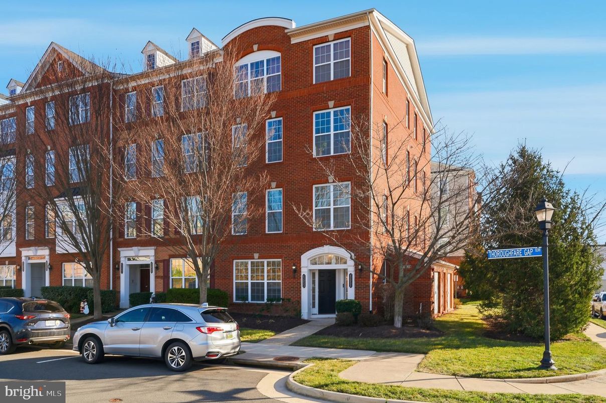 Exterior, Facade, Brick Facade, Condo Building