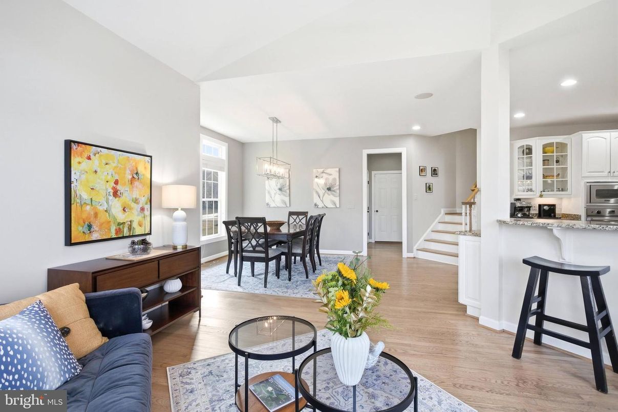 Chandelier, Dining room, Interior, Kitchen, Pendant Lights, Recessed Lighting, Stainless Steel Appliances, Wood Texture Flooring