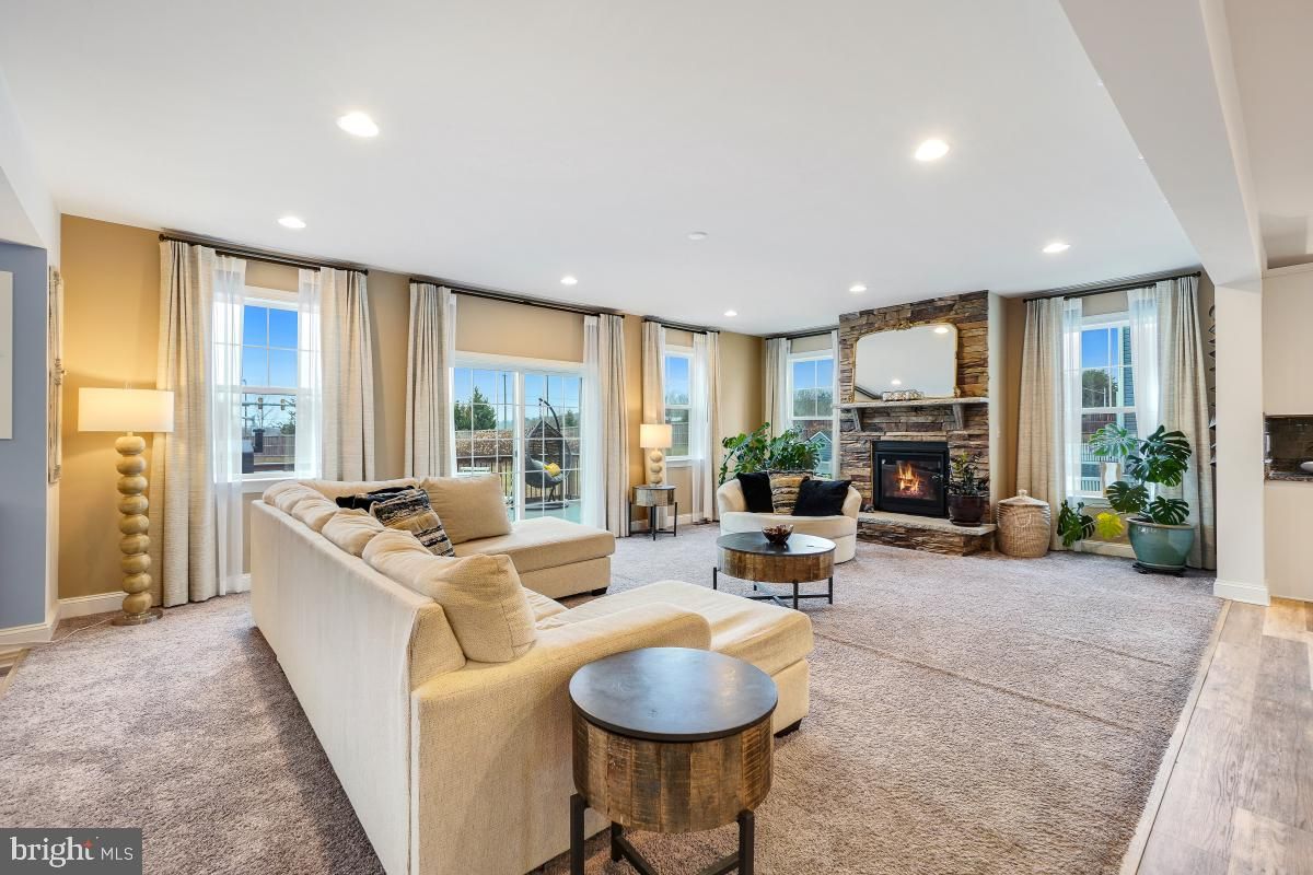 Fireplace, Interior, Living room, Recessed Lighting, Stone Walls, Wood Texture Flooring