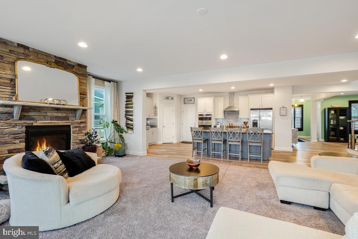 Fireplace, Interior, Kitchen, Living room, Recessed Lighting, Stainless Steel Appliances, Stone Walls, Wood Texture Flooring