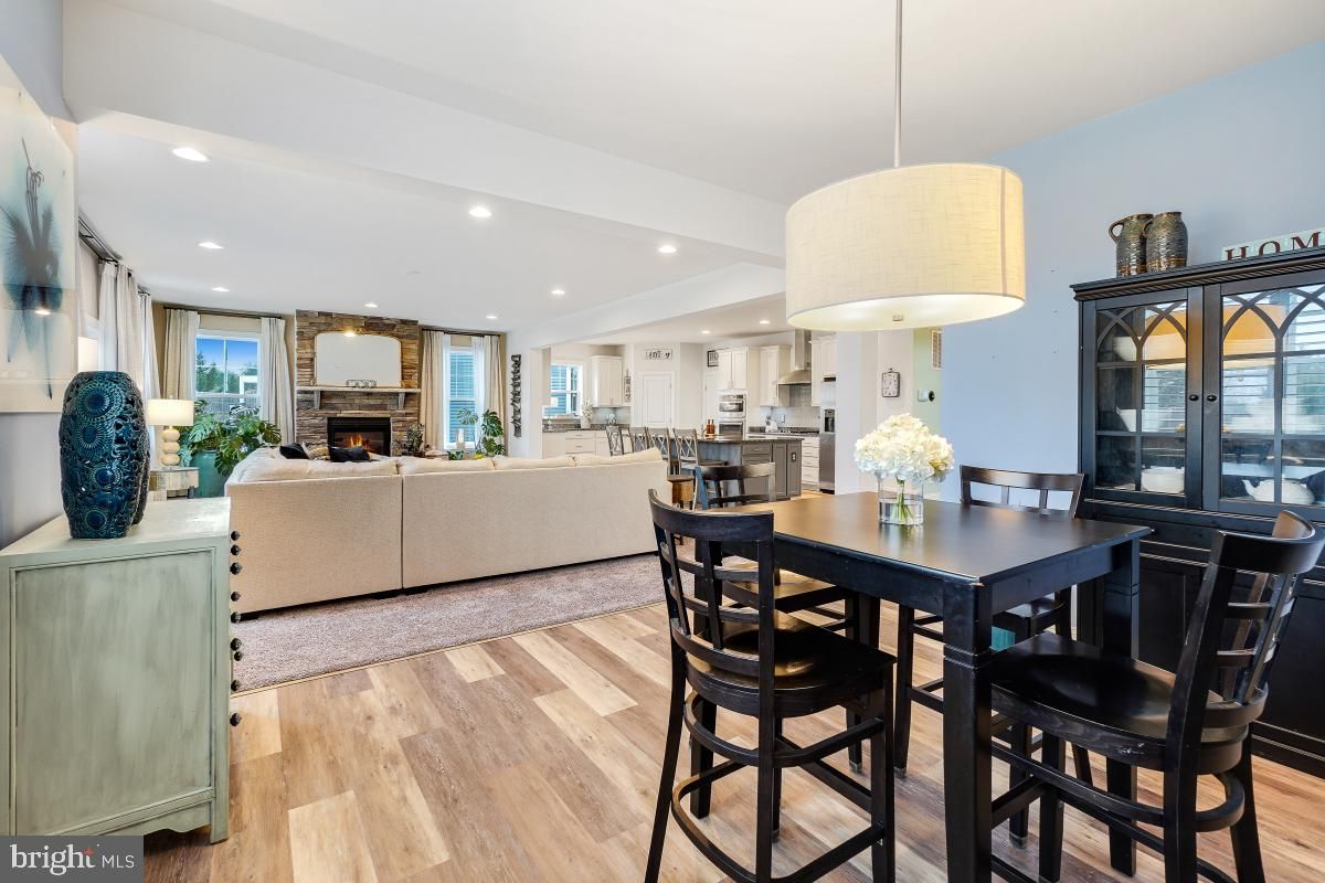 Dining room, Fireplace, Interior, Kitchen, Living room, Pendant Lights, Recessed Lighting, Wood Texture Flooring