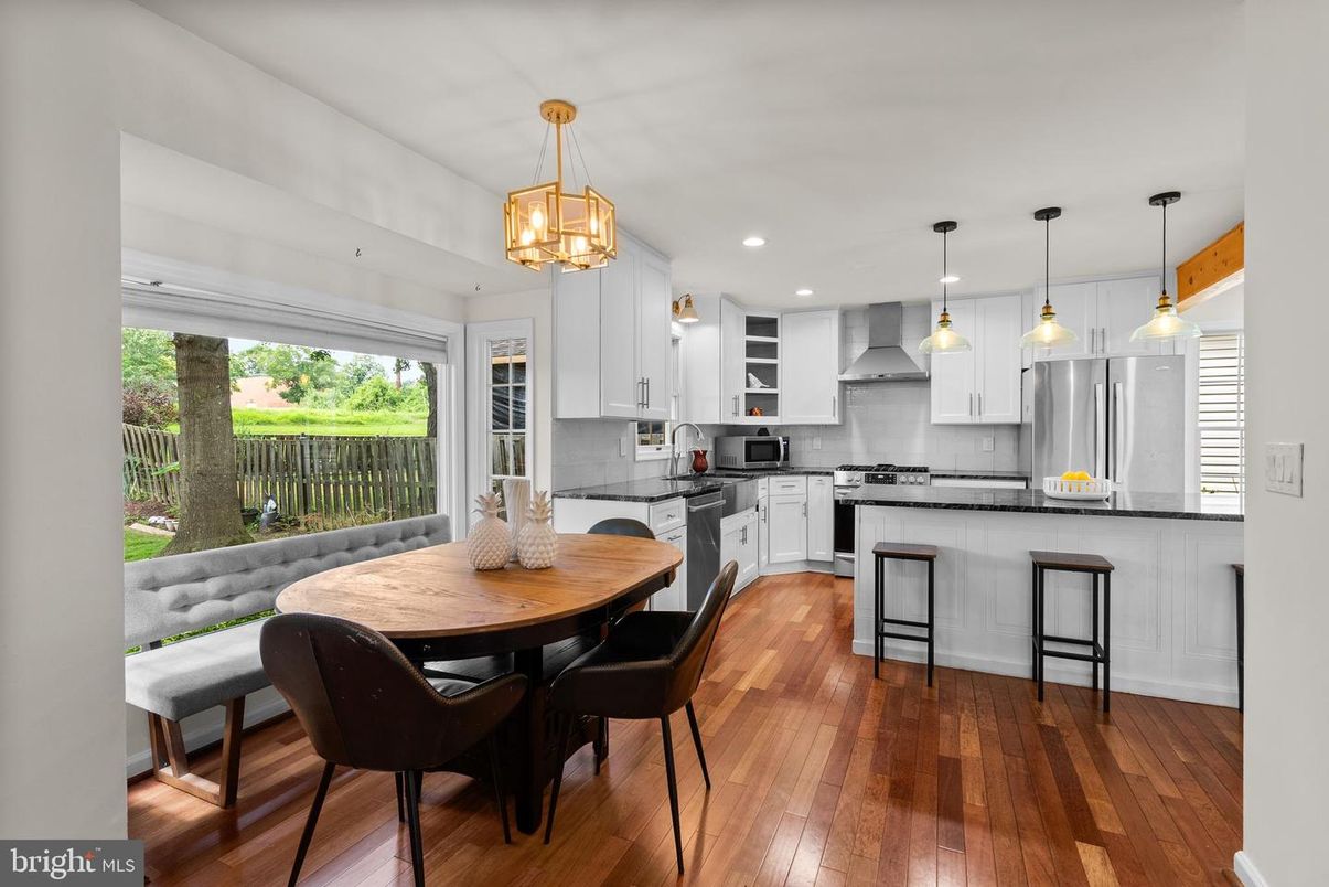 Dining room, Interior, Kitchen, Pendant Lights, Recessed Lighting, Stainless Steel Appliances, Wood Texture Flooring