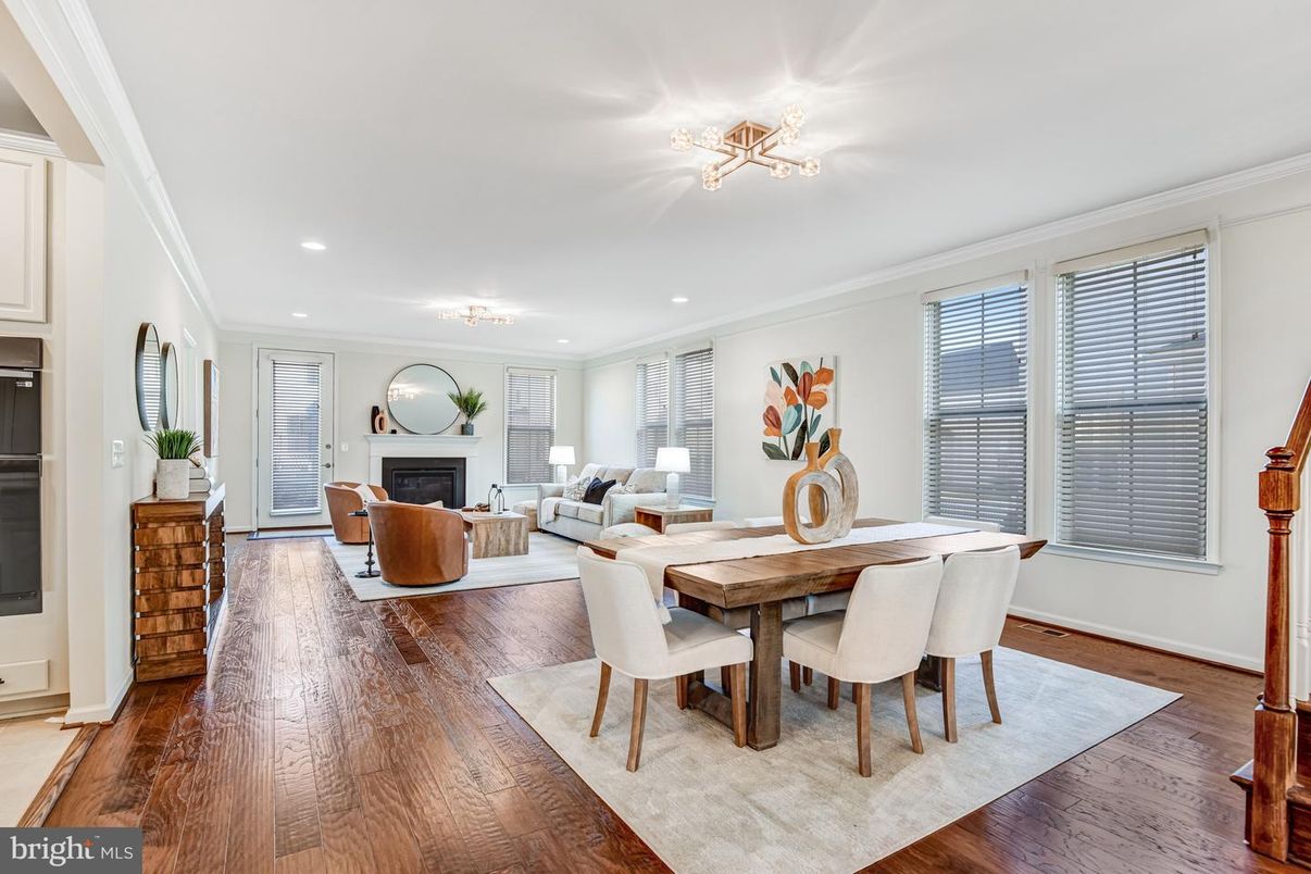 Dining room, Fireplace, Interior, Living room, Recessed Lighting, Wood Texture Flooring
