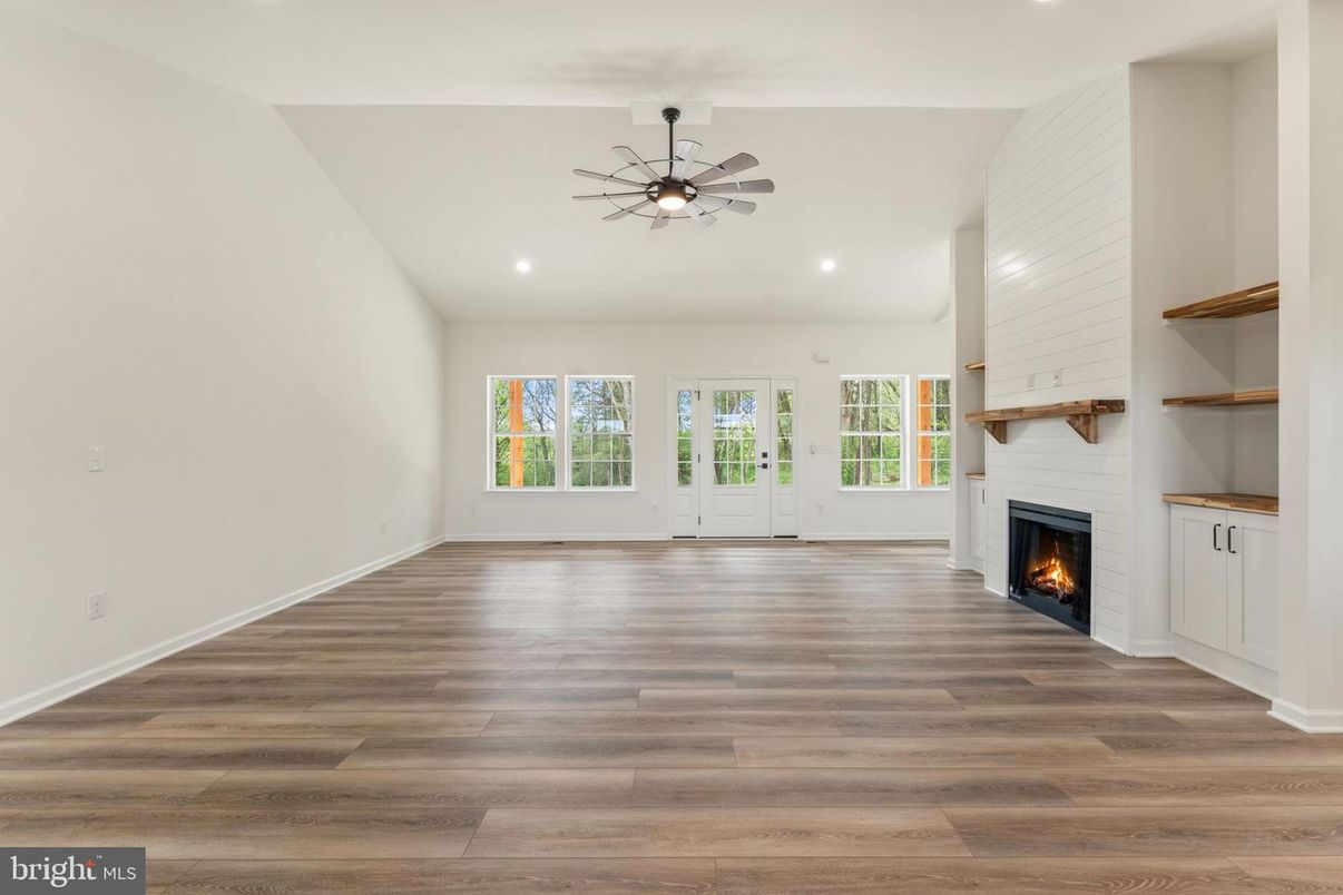 Empty room, Fireplace, Interior, Recessed Lighting, Wood Texture Flooring