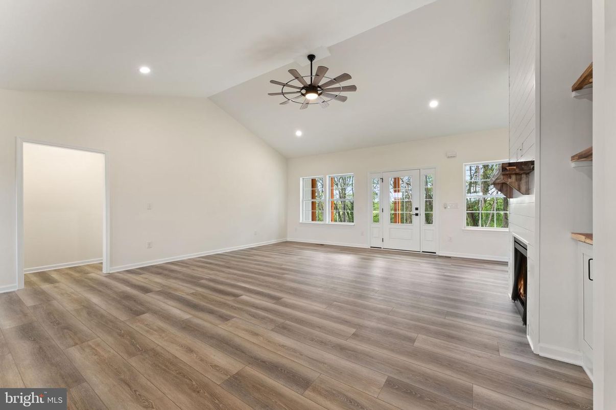 Empty room, Fireplace, Interior, Recessed Lighting, Wood Texture Flooring