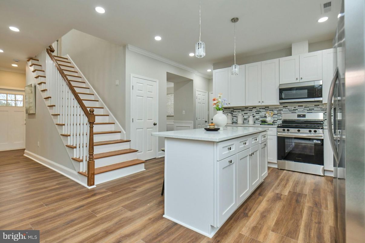 Interior, Kitchen, Pendant Lights, Recessed Lighting, Stainless Steel Appliances, Wood Texture Flooring