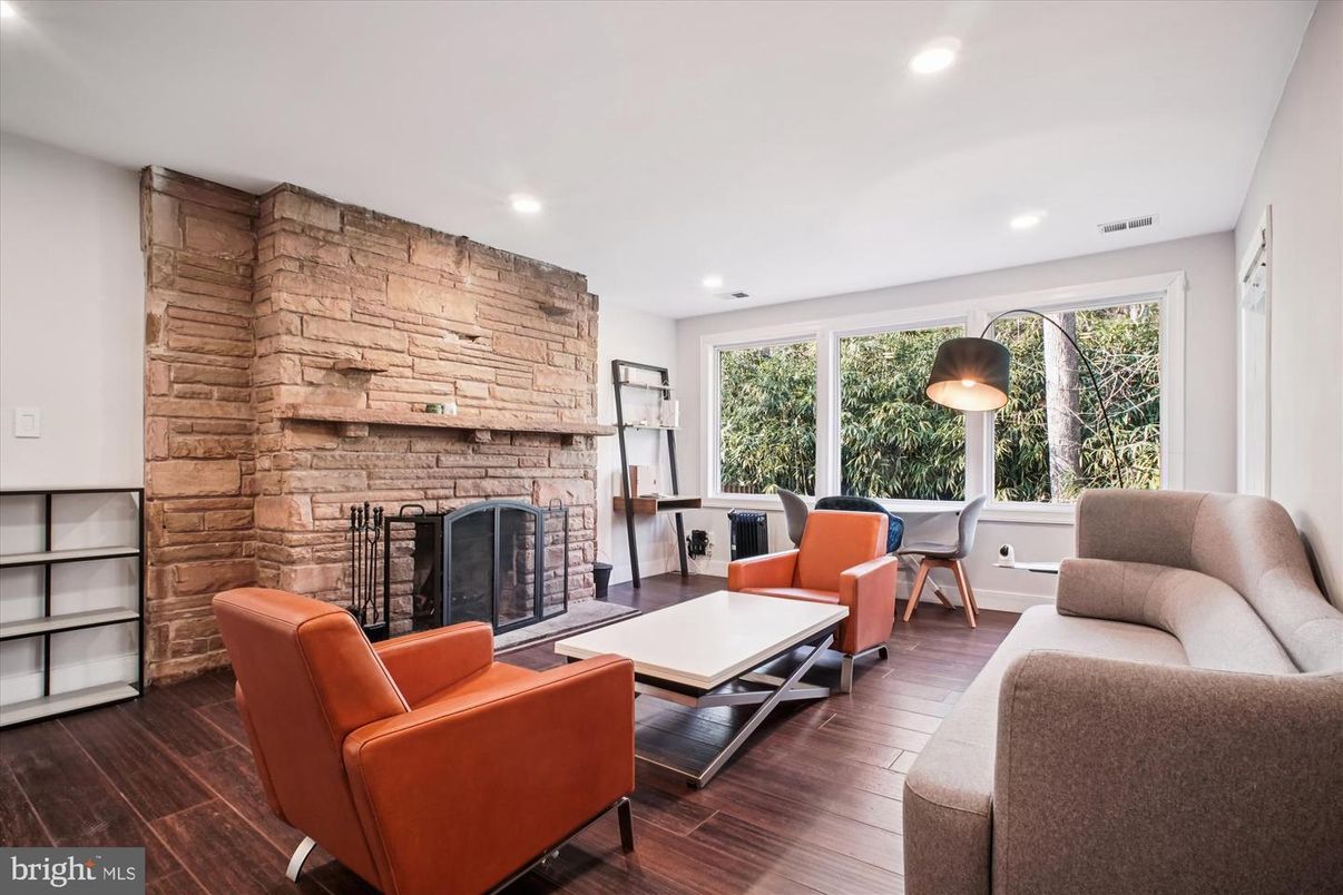 Fireplace, Interior, Living room, Recessed Lighting, Stone Walls, Wood Texture Flooring