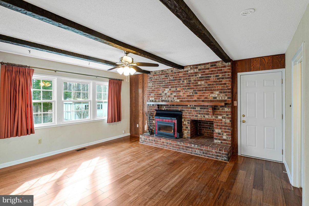 Empty room, Fireplace, Interior, Stone Walls, Wood Texture Flooring