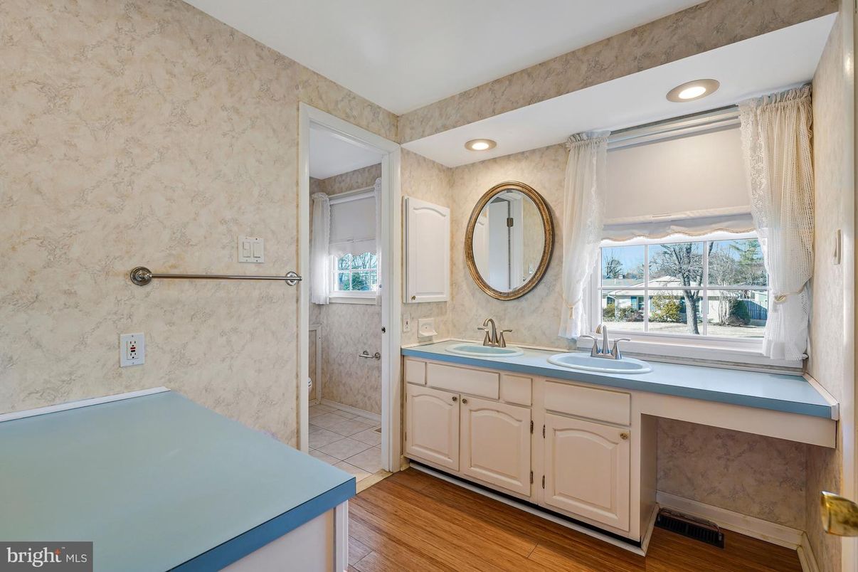 Bathroom, Dual Sink Vanities, Interior, Recessed Lighting, Wood Texture Flooring