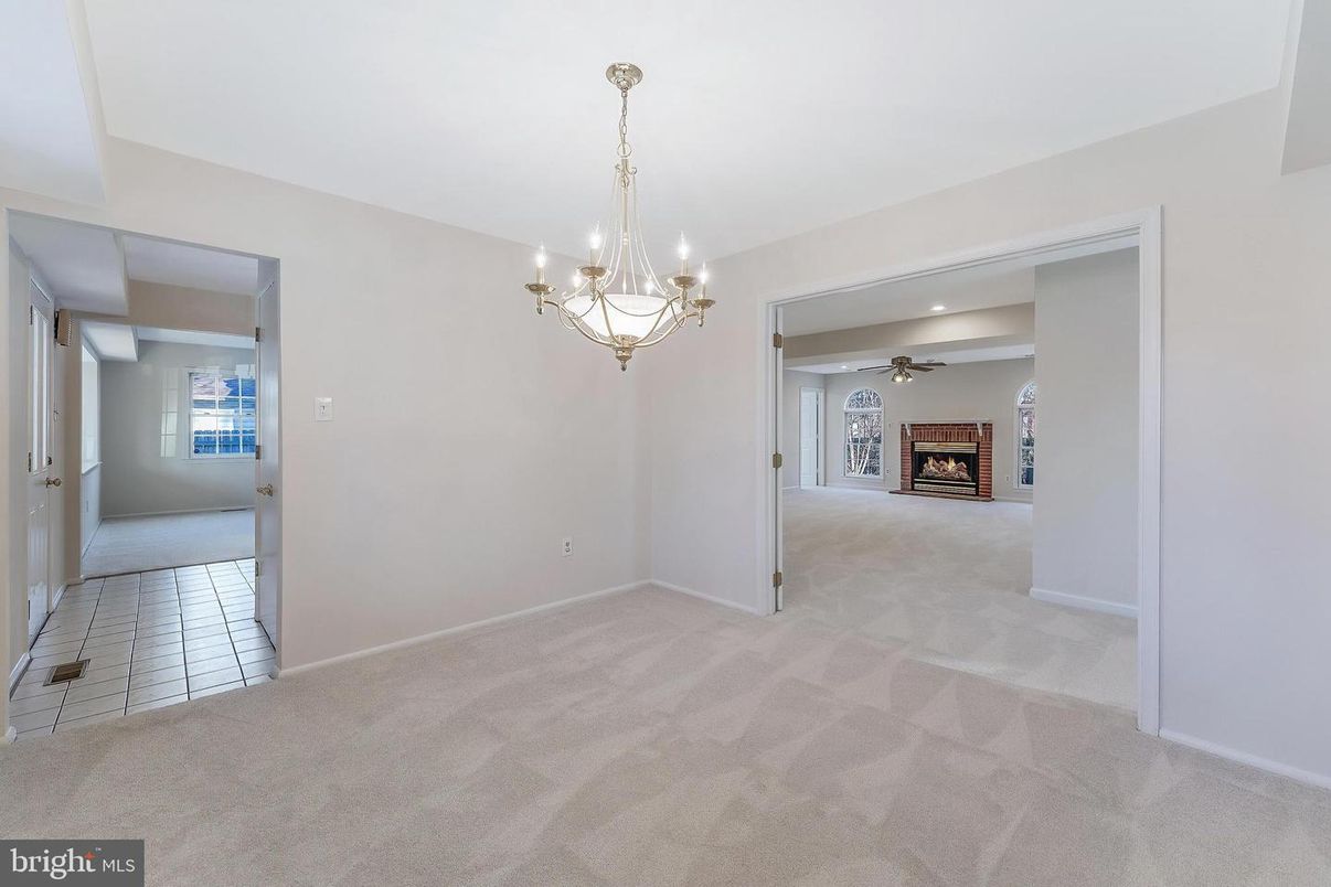 Chandelier, Empty room, Fireplace, Interior