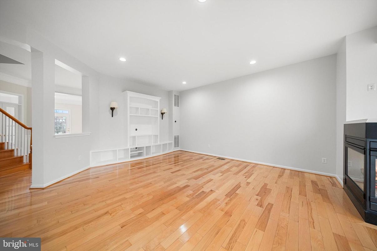 Empty room, Fireplace, Interior, Recessed Lighting, Wood Texture Flooring
