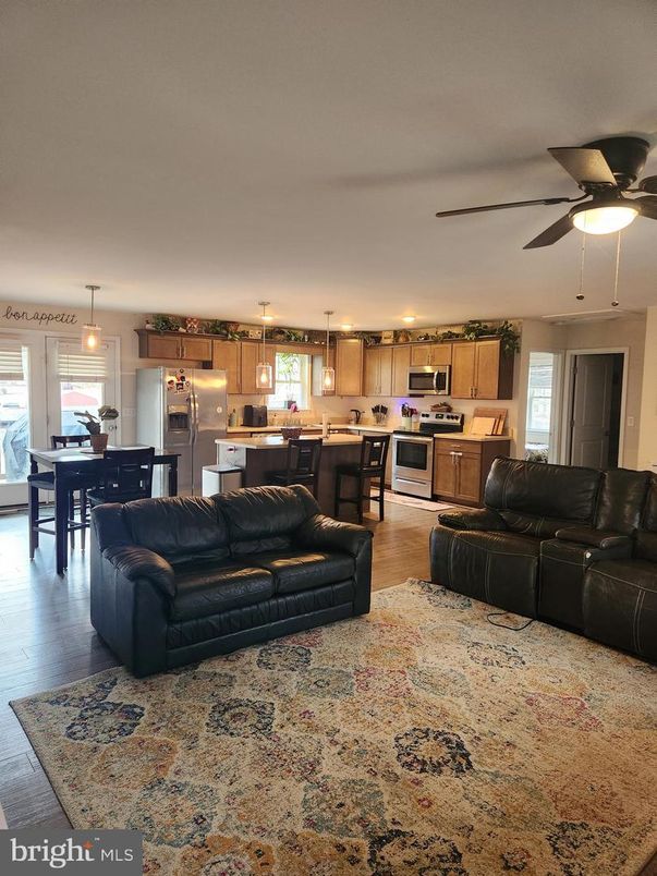 Dining room, Interior, Kitchen, Living room, Pendant Lights, Stainless Steel Appliances, Wood Texture Flooring