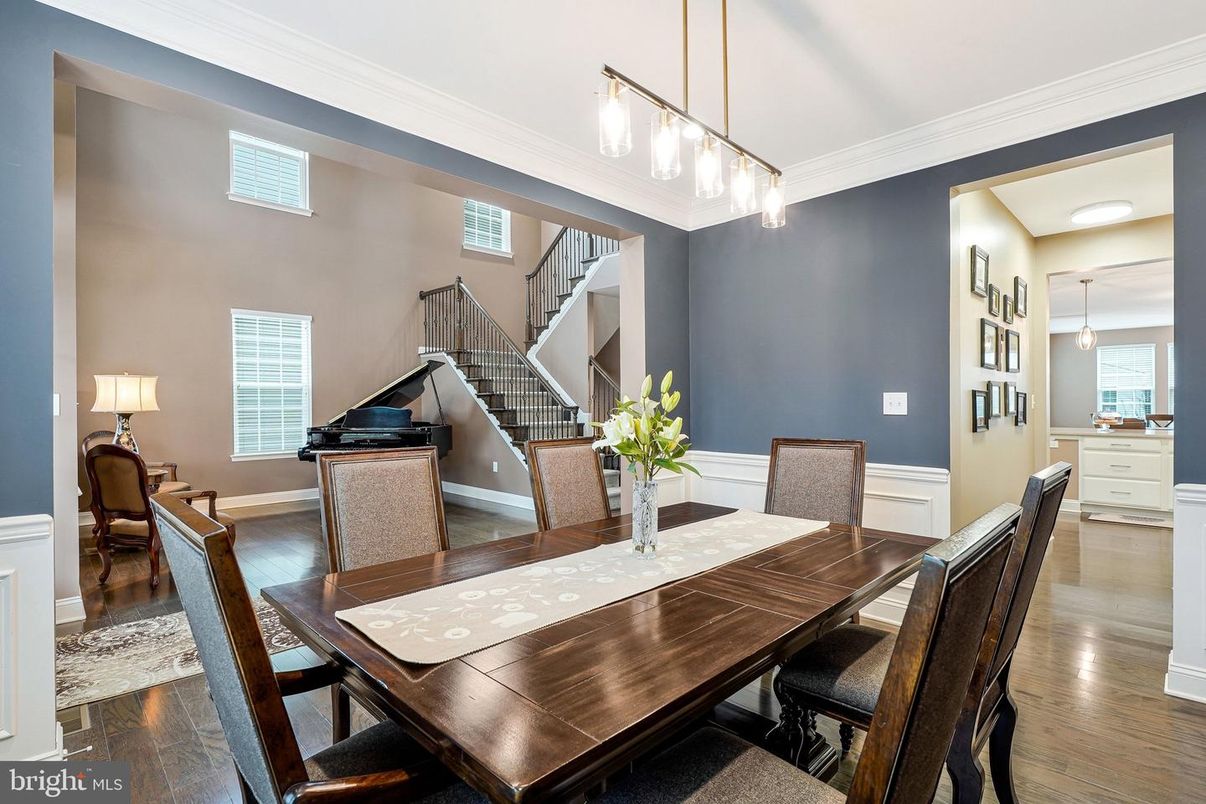 Dining room, Interior, Pendant Lights, Piano, Wood Texture Flooring