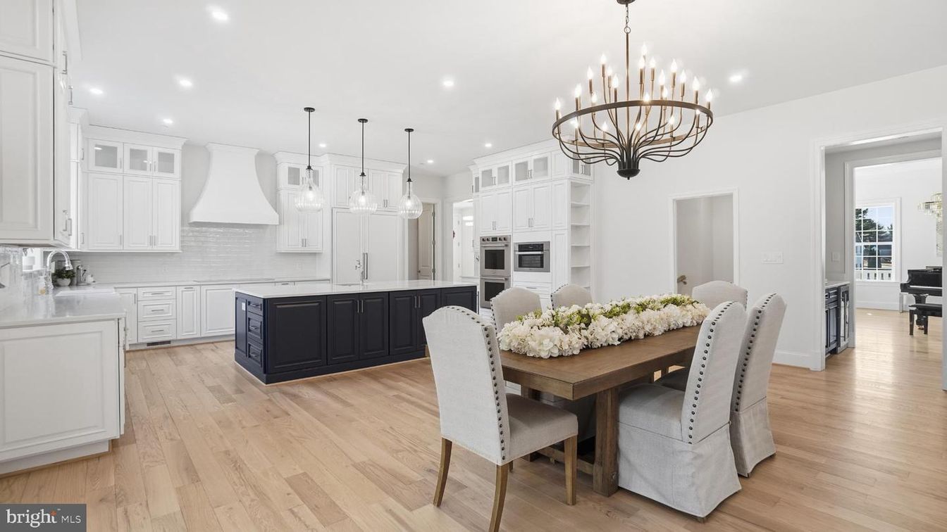 Chandelier, Dining room, Interior, Kitchen, Pendant Lights, Recessed Lighting, Stainless Steel Appliances, Wood Texture Flooring