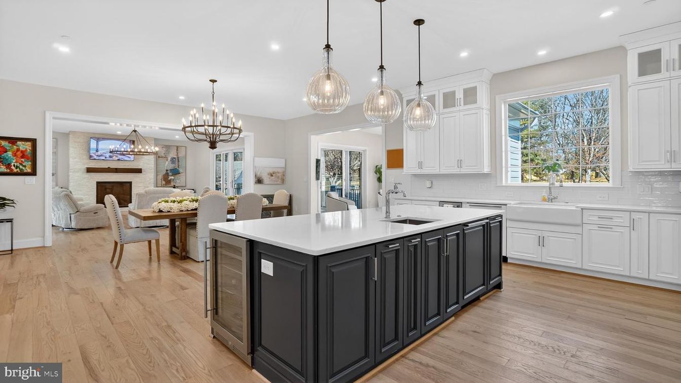 Chandelier, Dining room, Fireplace, Interior, Kitchen, Pendant Lights, Recessed Lighting, Stone Walls, Wood Texture Flooring