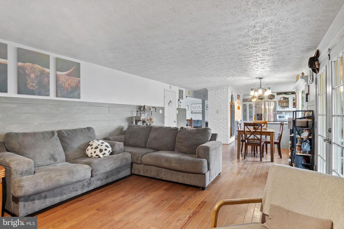 Chandelier, Dining room, Interior, Kitchen, Living room, Stone Walls, Wood Texture Flooring