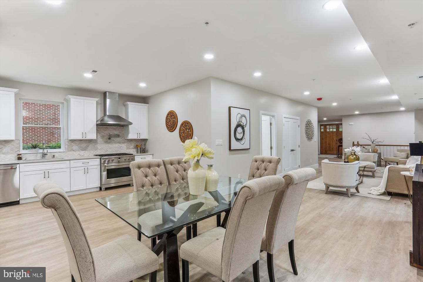 Dining room, Interior, Kitchen, Living room, Recessed Lighting, Stainless Steel Appliances, Wood Texture Flooring