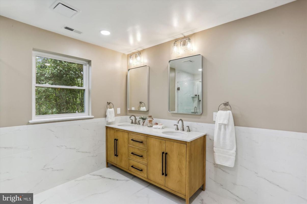 Bathroom, Dual Sink Vanities, Interior, Marble, Marble Walls, Recessed Lighting