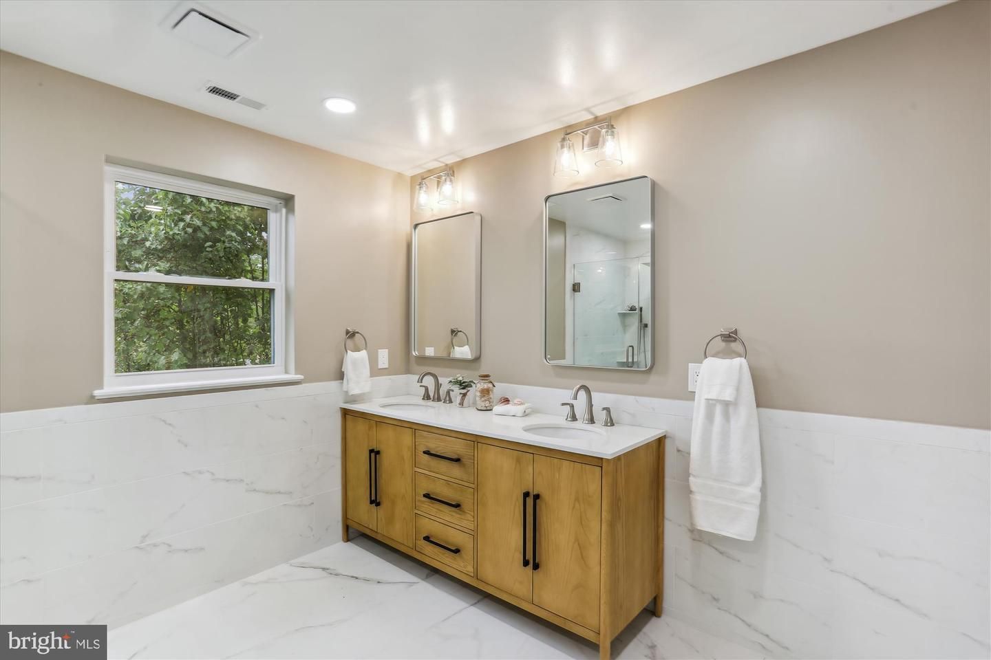 Bathroom, Dual Sink Vanities, Interior, Marble, Marble Walls, Recessed Lighting