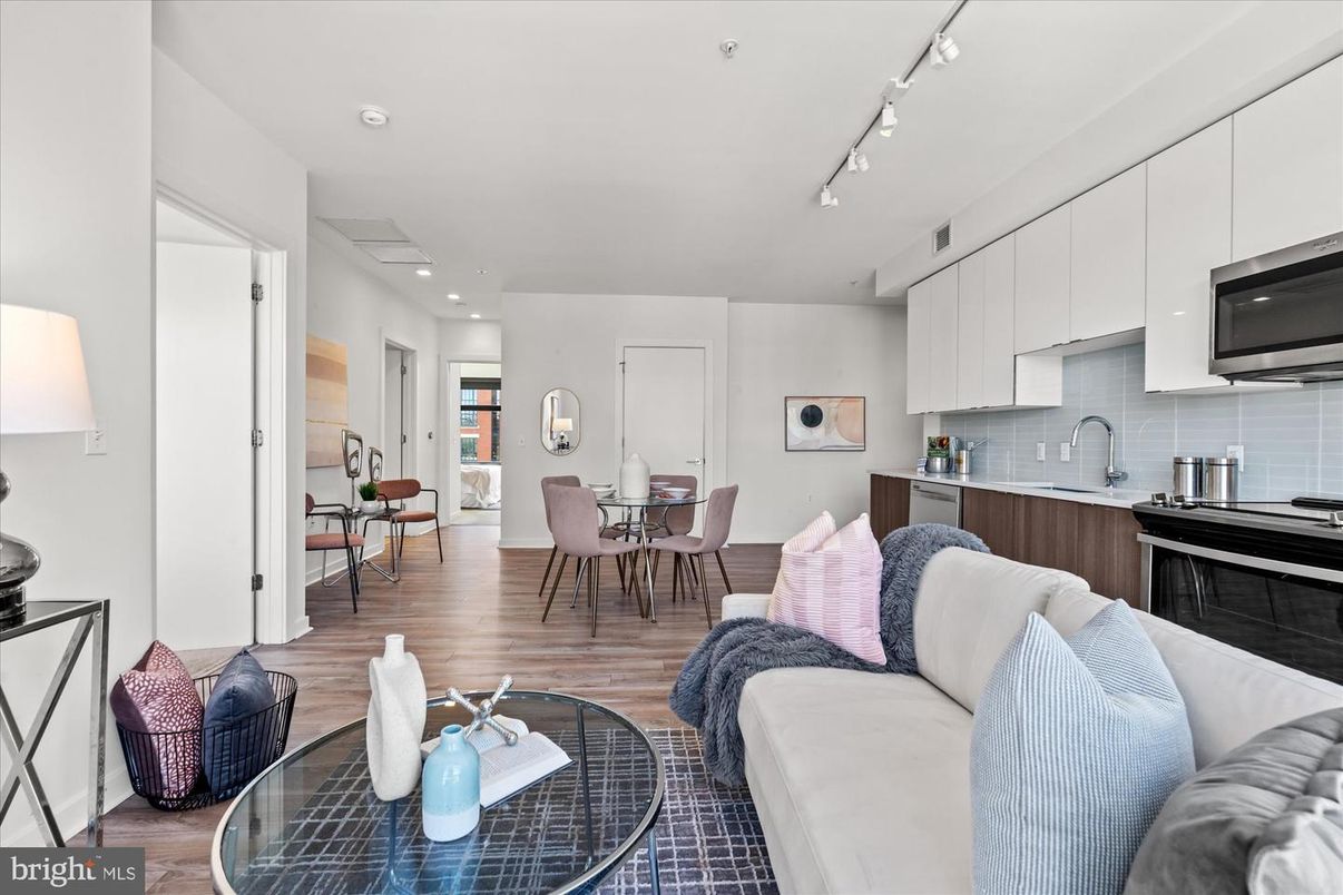 Dining room, Interior, Kitchen, Living room, Recessed Lighting, Stainless Steel Appliances, Wood Texture Flooring