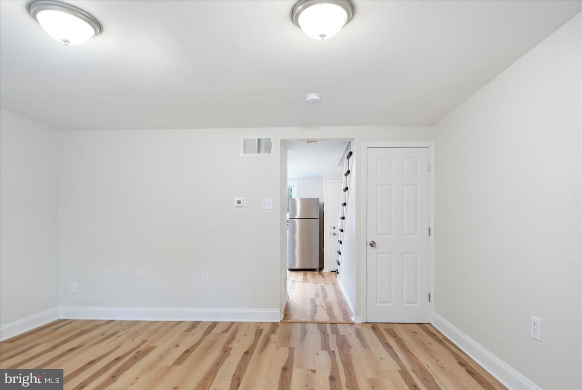 Empty room, Interior, Kitchen, Stainless Steel Appliances, Wood Texture Flooring