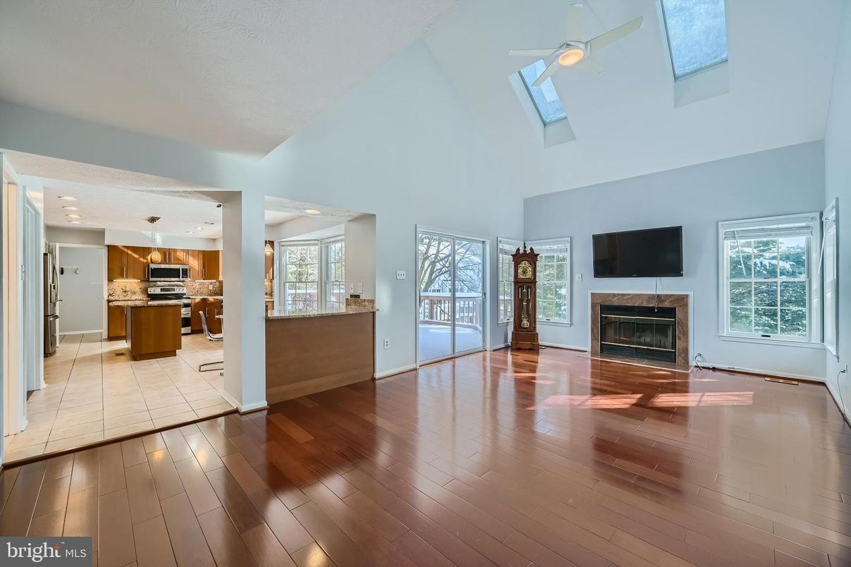 Empty room, Fireplace, Interior, Kitchen, Recessed Lighting, Wood Texture Flooring