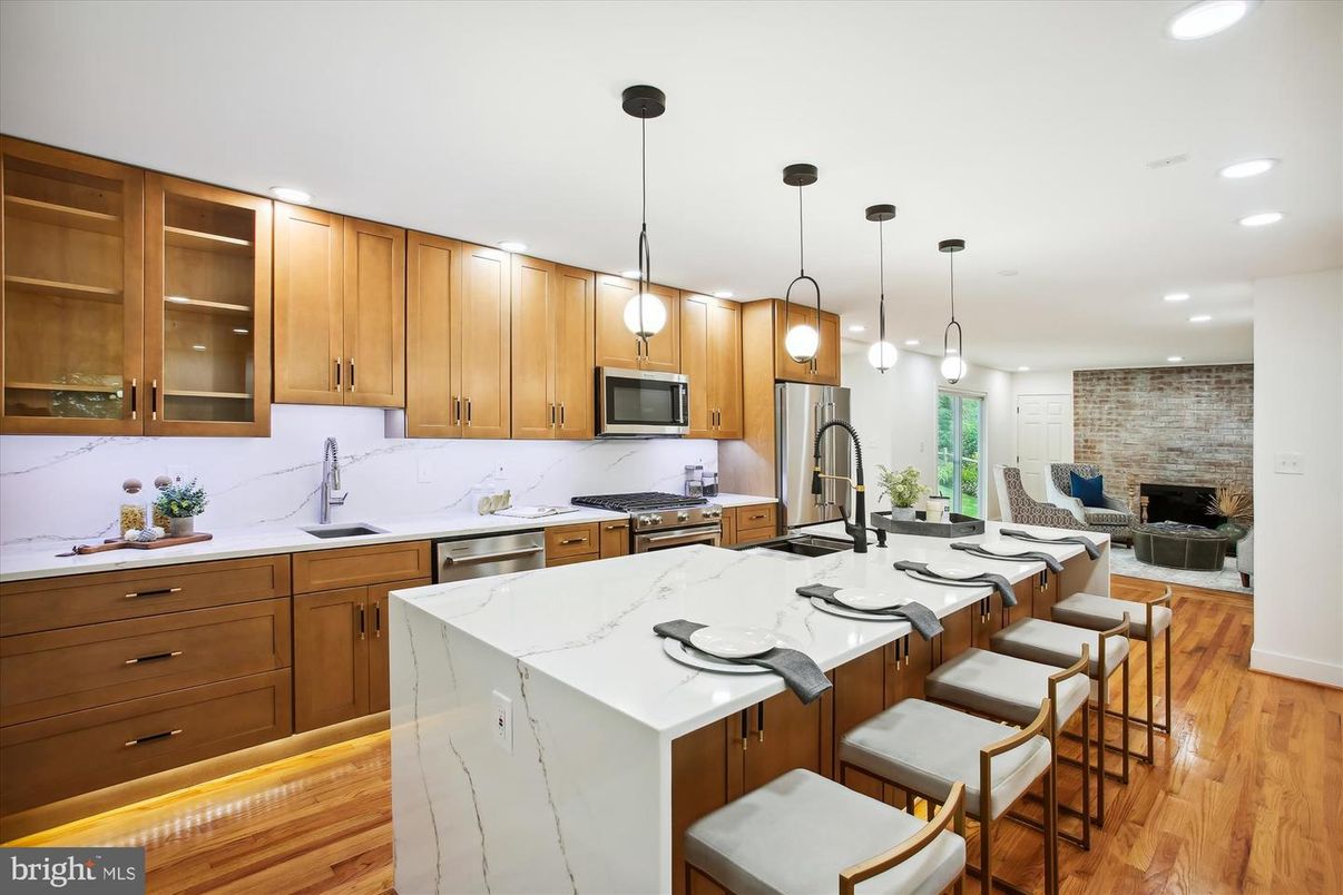 Interior, Kitchen, Pendant Lights, Recessed Lighting, Stainless Steel Appliances, Stone Walls, Wood Texture Flooring