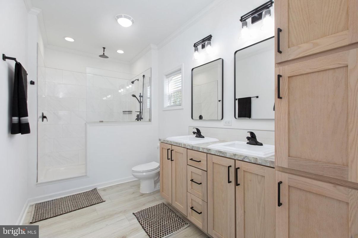 Bathroom, Dual Sink Vanities, Glass Shower, Interior, Recessed Lighting, Wood Texture Flooring